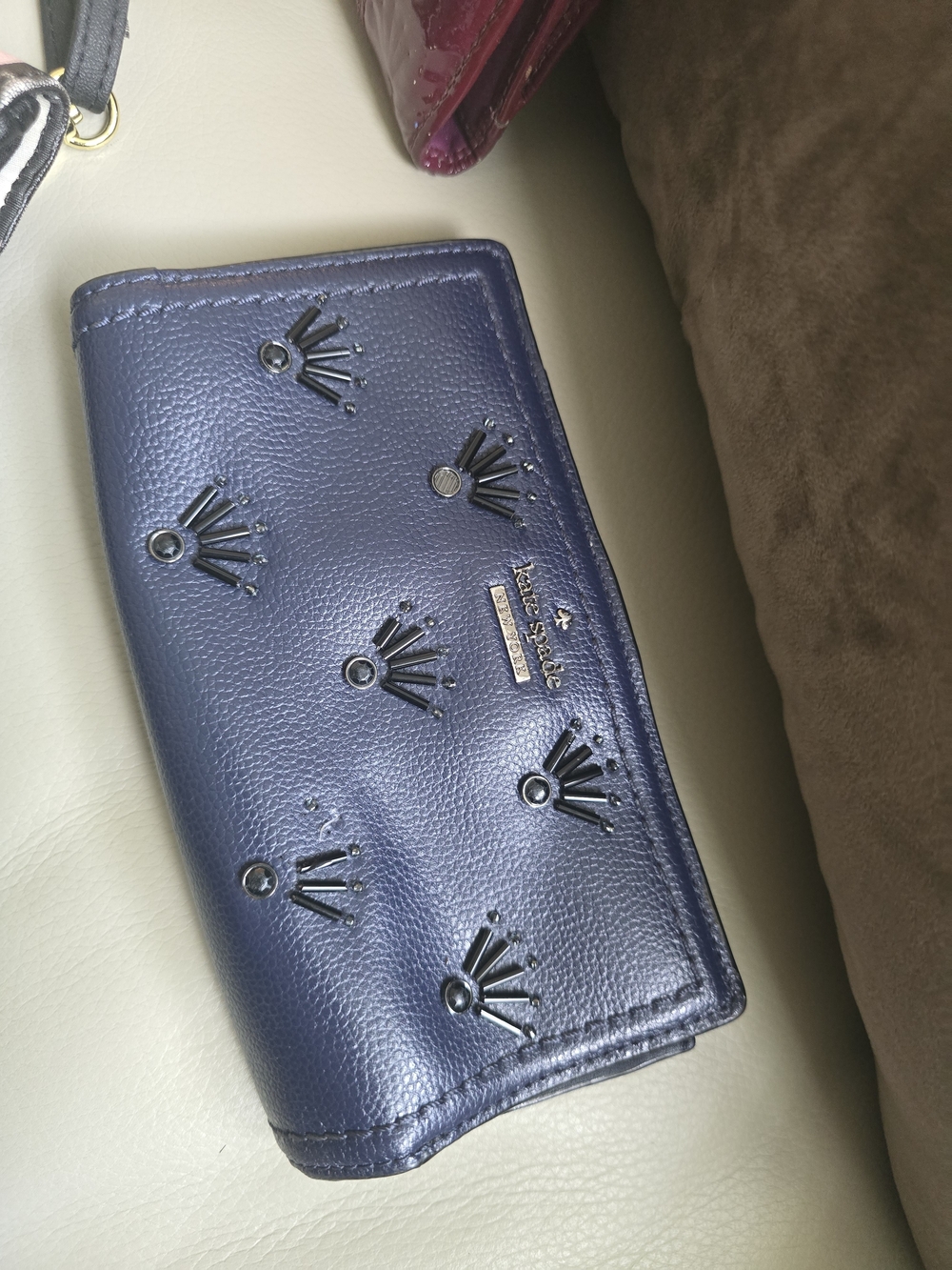 kate spade navy leather continental wallet with crown cutouts